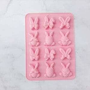 MOLDE SILICONA 6 HUEVITOS DECORADOS + 6 OREJAS c/MOÑO