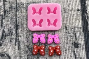 MOLDE SILICONA 4 MINI MOÑOS COQUETTE c/LUNARES
